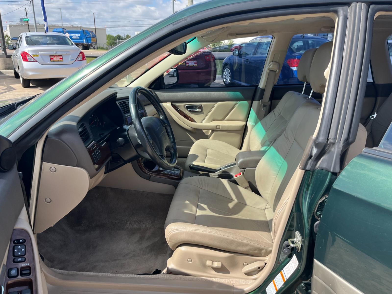2003 green /TAN Subaru Outback Limited Wagon (4S3BH686737) with an 2.5L H4 SOHC 16V engine, 5-Speed Manual Overdrive transmission, located at 14700 Tomball Parkway 249, Houston, TX, 77086, (281) 444-2200, 29.928619, -95.504074 - Photo #8